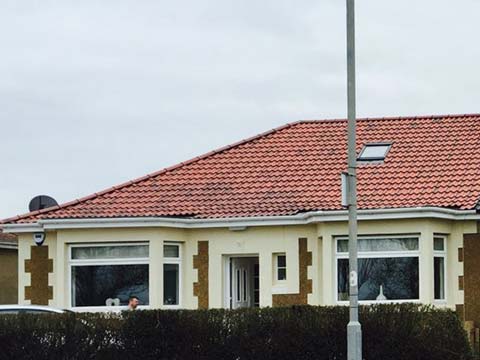 Terracotta roof with Velux window